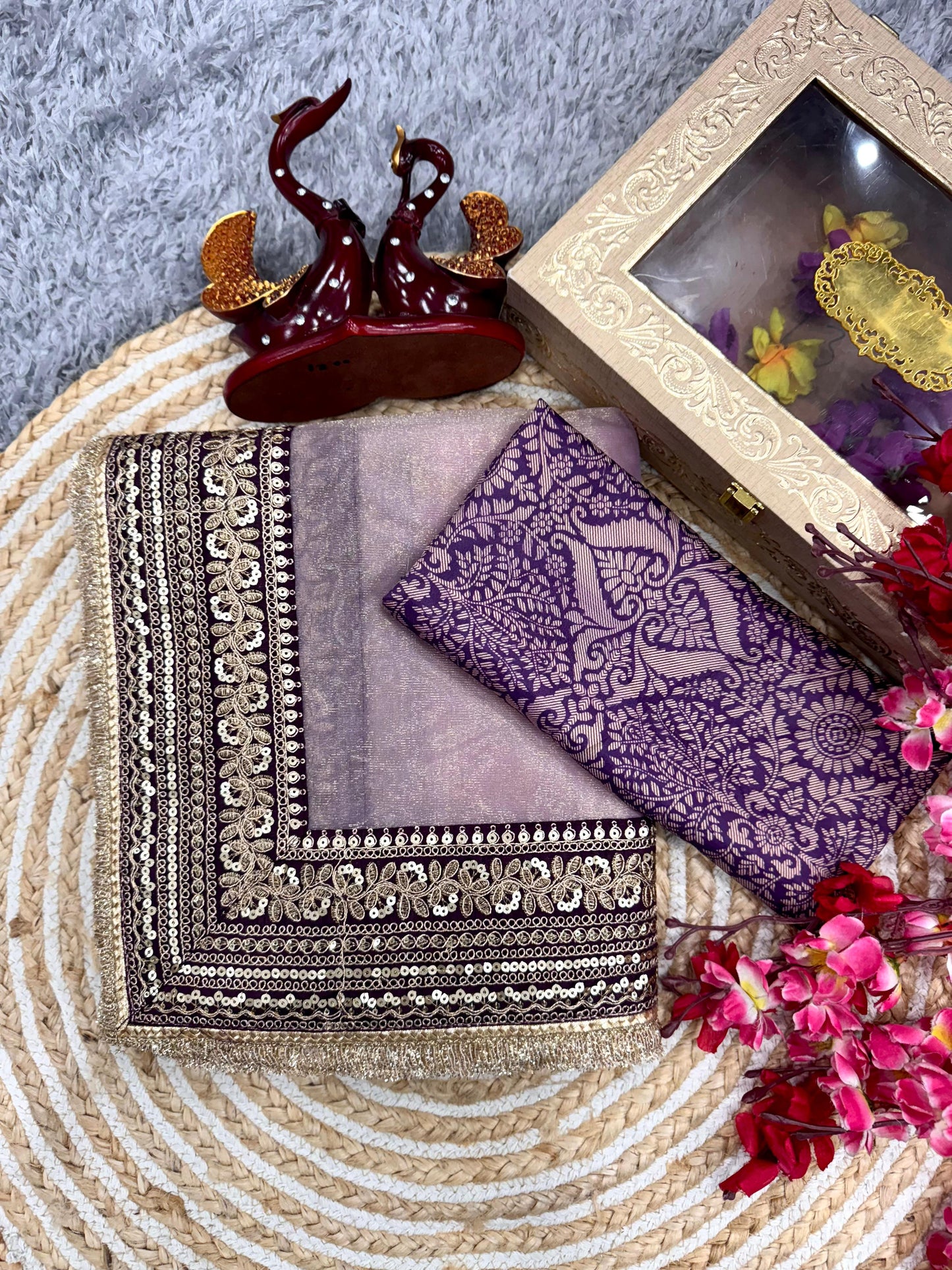 Elegant Mauve Tissue Designer Saree with Intricate Golden Detailing