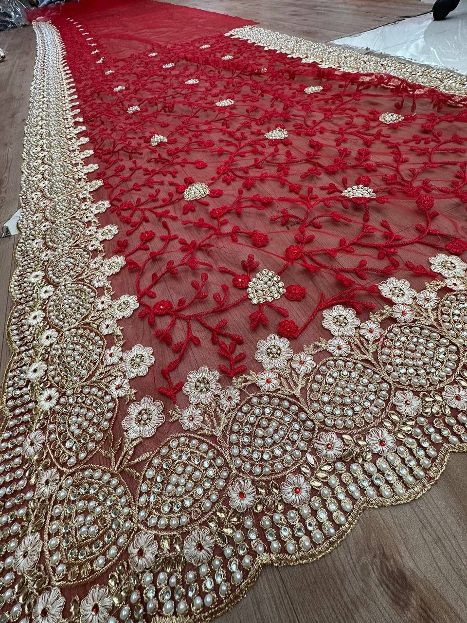 Premium Net Saree with Intricate Hand Embroidery And Border