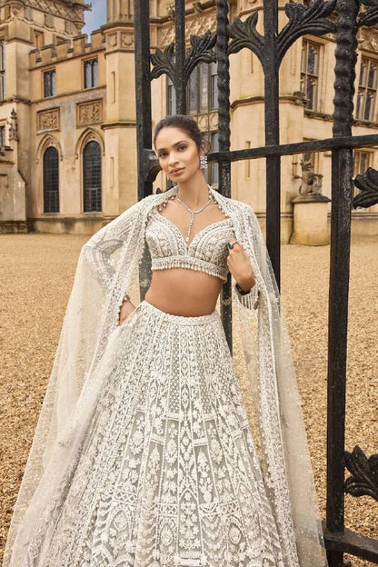 Elegant White Net Lehenga with Unstitched Blouse And Pearl Dupatta