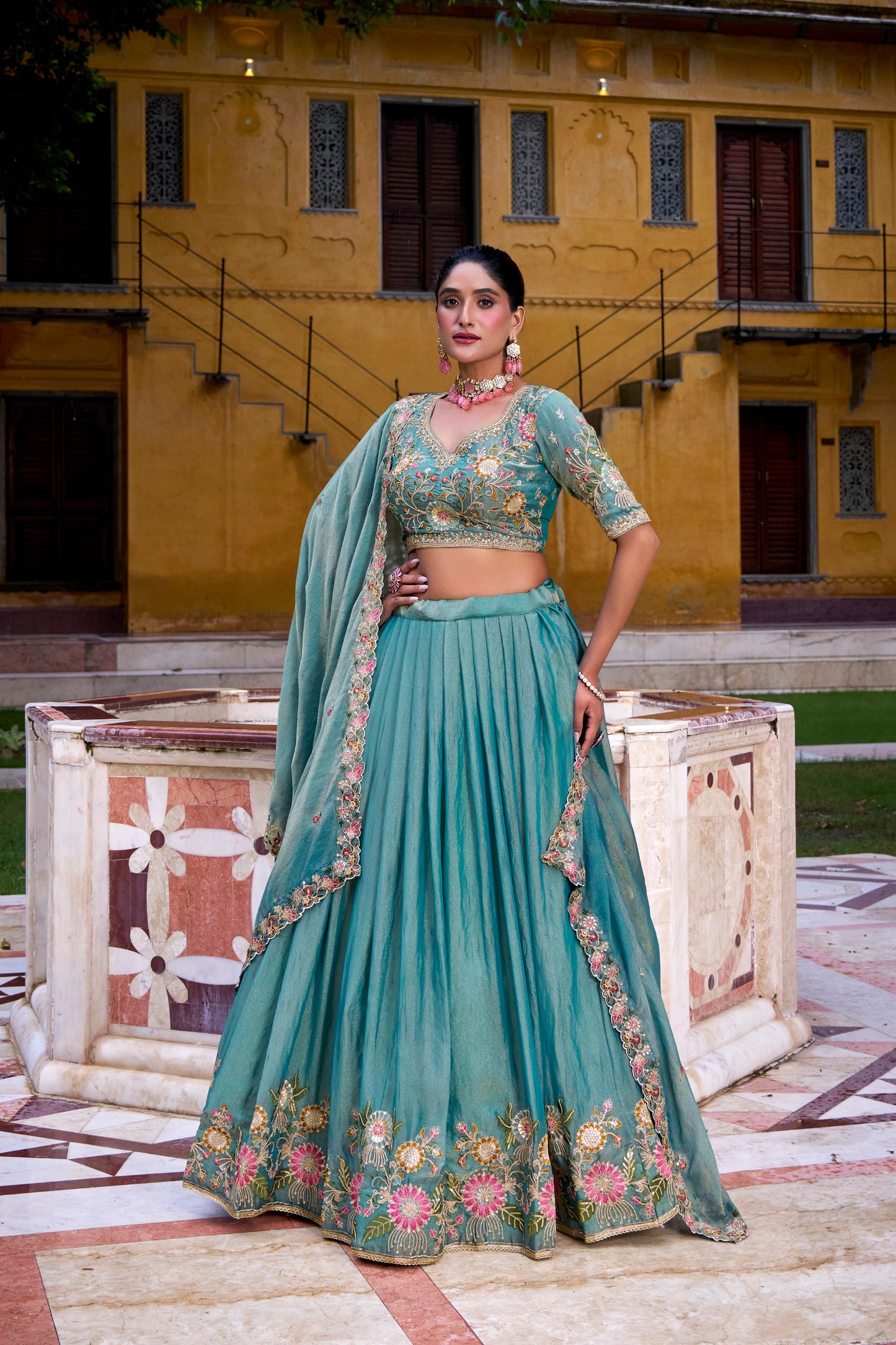 Designer Teal Lehengas with Hand-Embroidered Florals