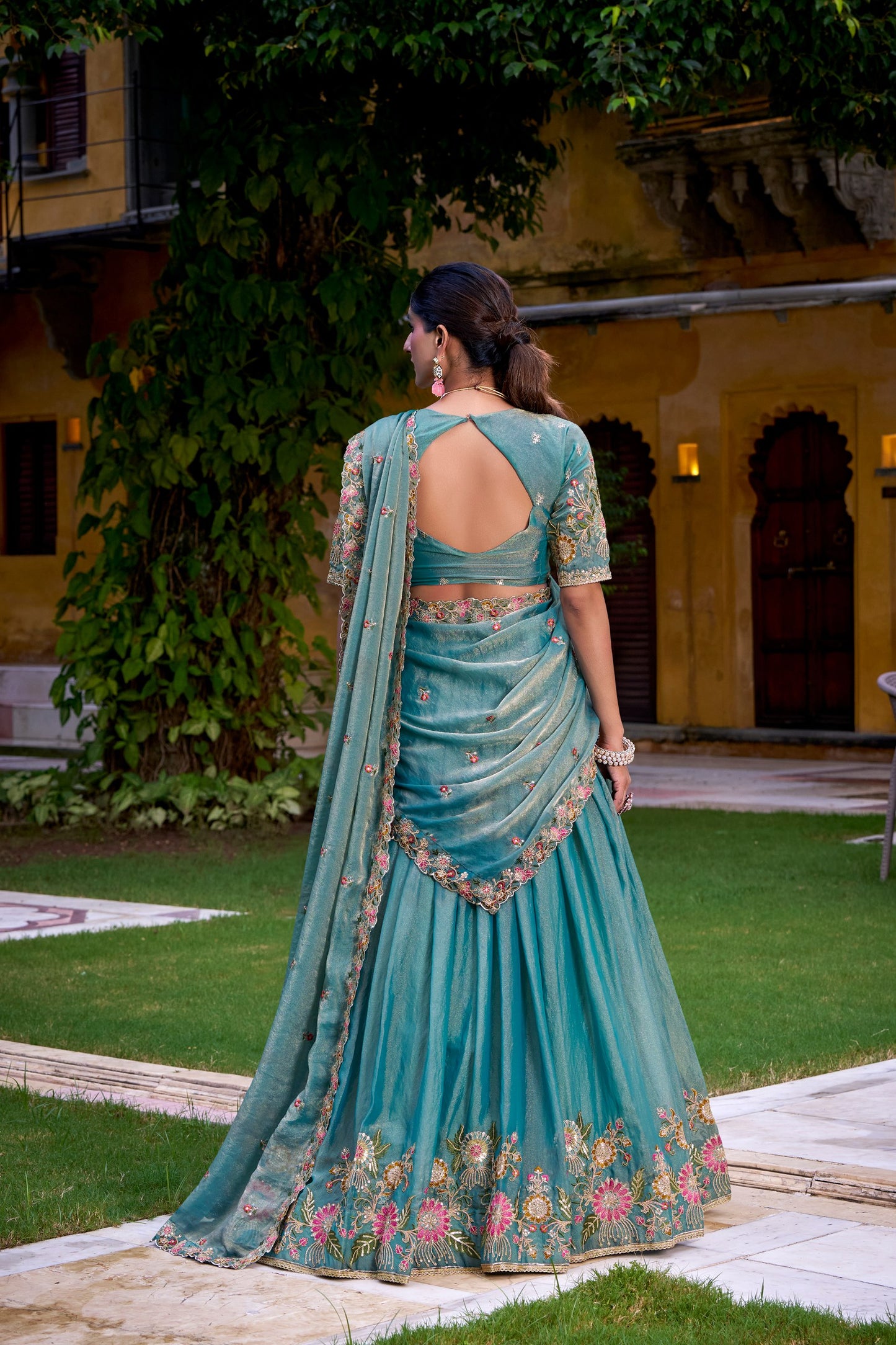 Designer Teal Lehengas with Hand-Embroidered Florals