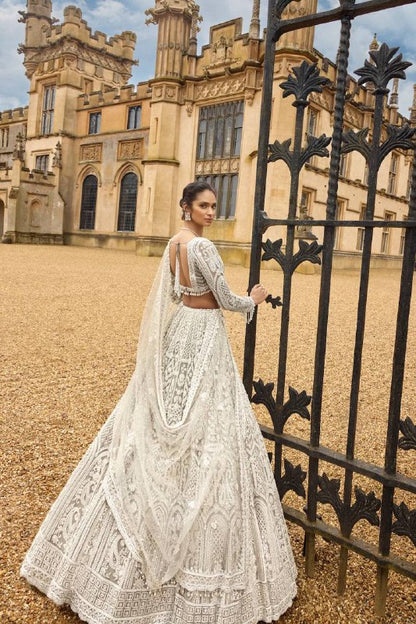 Elegant White Net Lehenga with Unstitched Blouse And Pearl Dupatta