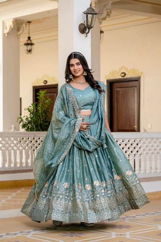 beautiful teal or dusty blue Indian lehenga with gold embroidery