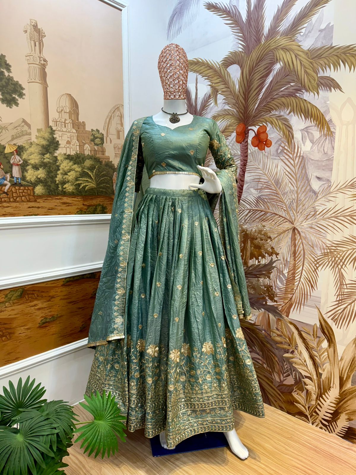 beautiful teal or dusty blue Indian lehenga with gold embroidery