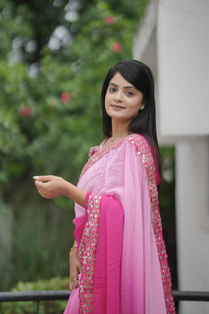 Rani Pink Silk Saree with Mirror Embroidery and Designer Blouse