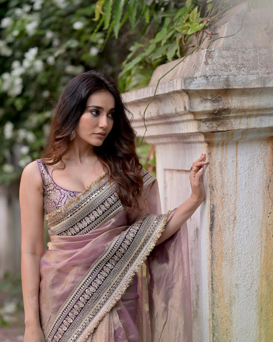 Elegant Mauve Tissue Designer Saree with Intricate Golden Detailing