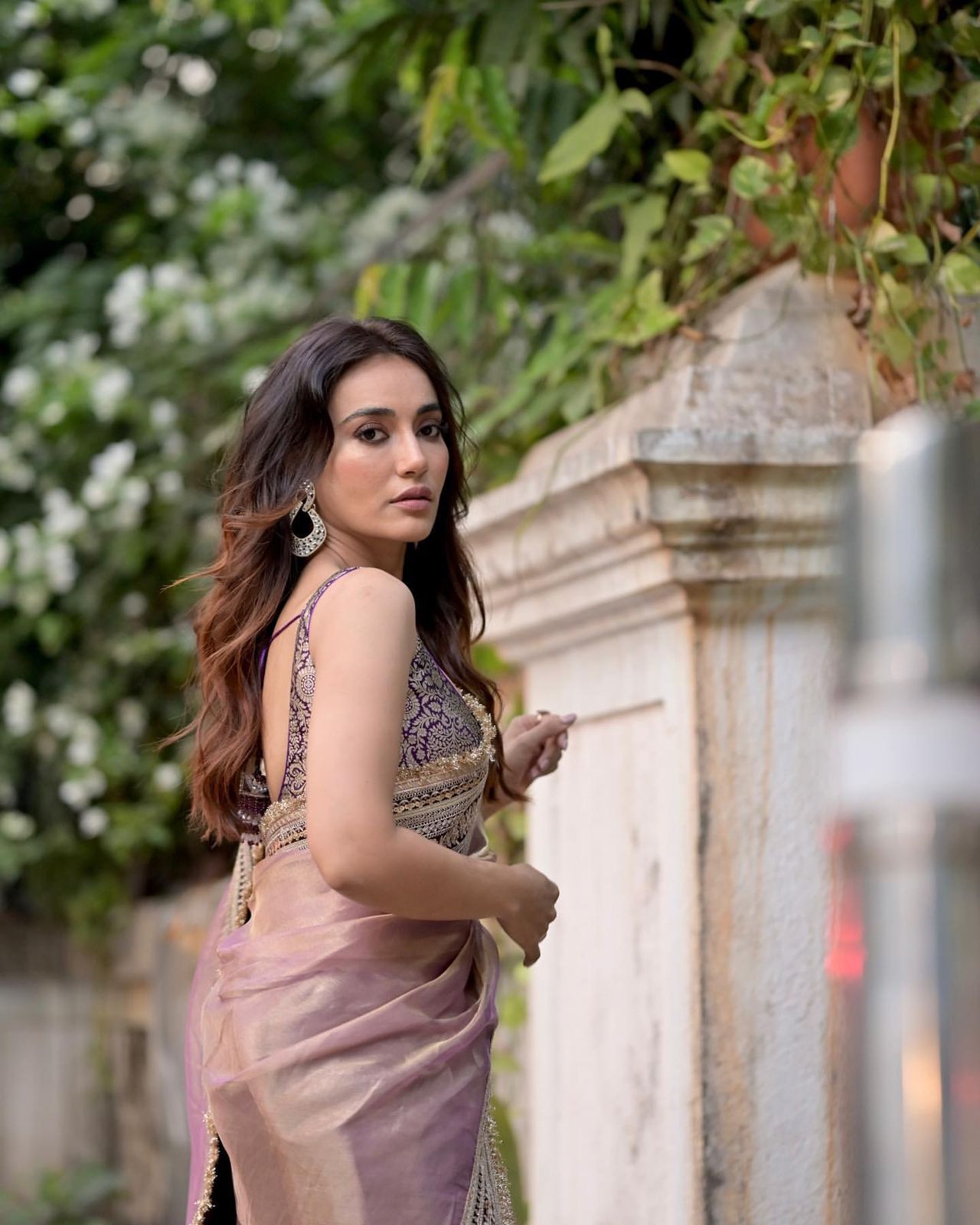 Elegant Mauve Tissue Designer Saree with Intricate Golden Detailing