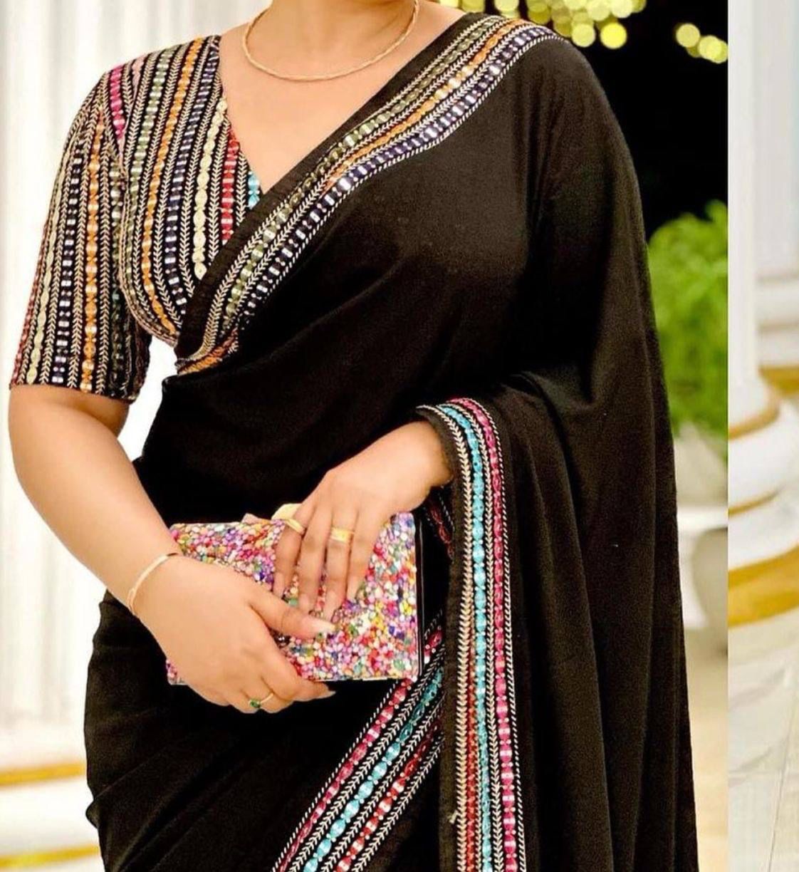 Elegant Black Georgette Saree with Multi color Embroidered Blouse