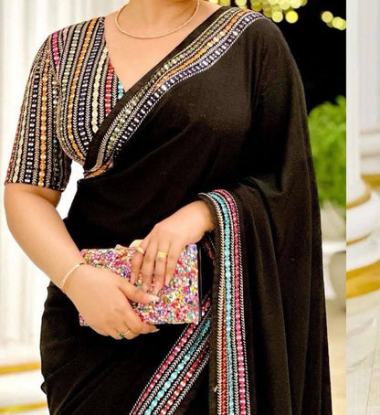 Elegant Black Georgette Saree with Multi color Embroidered Blouse