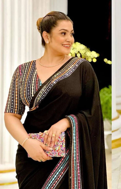 Elegant Black Georgette Saree with Multi color Embroidered Blouse