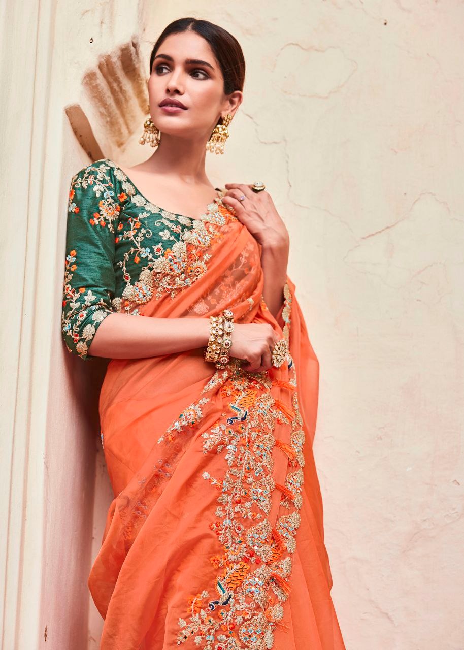 Stunning Orange Lightweight Saree with Detailed Thread Embroidery and Contrast Green Half-Sleeve Blouse