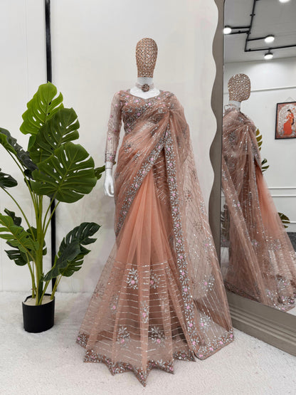 Peach Designer Saree in Soft Net with Heavy Work