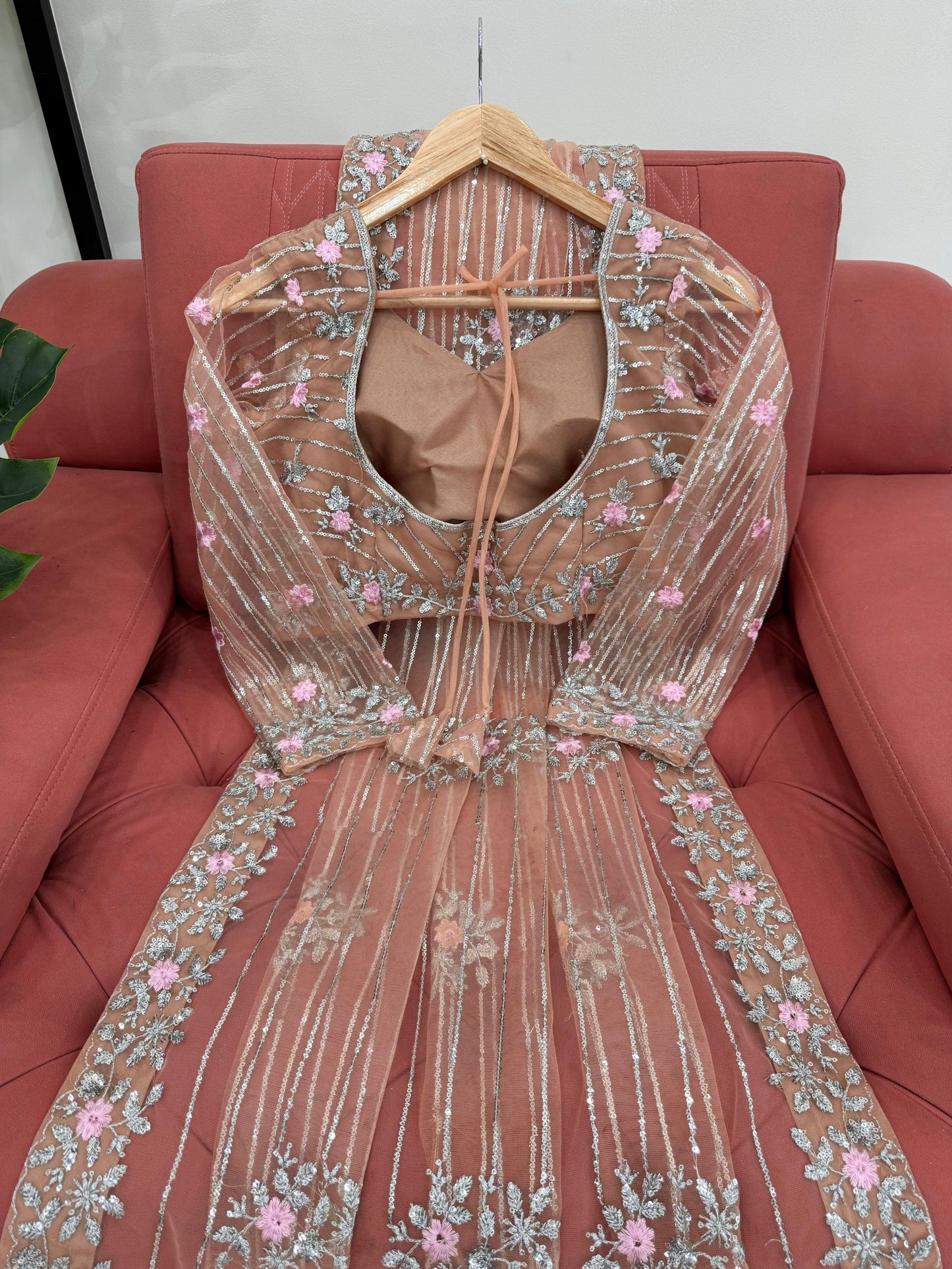 Peach Designer Saree in Soft Net with Heavy Work