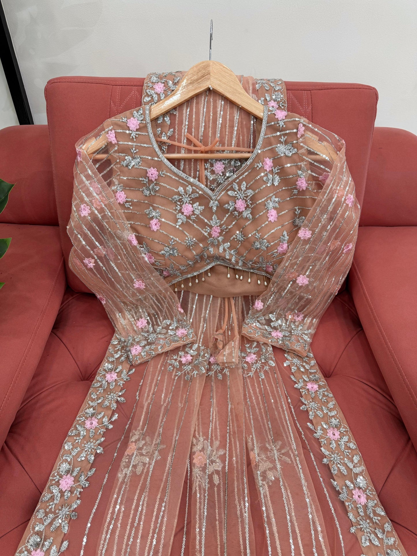 Peach Designer Saree in Soft Net with Heavy Work