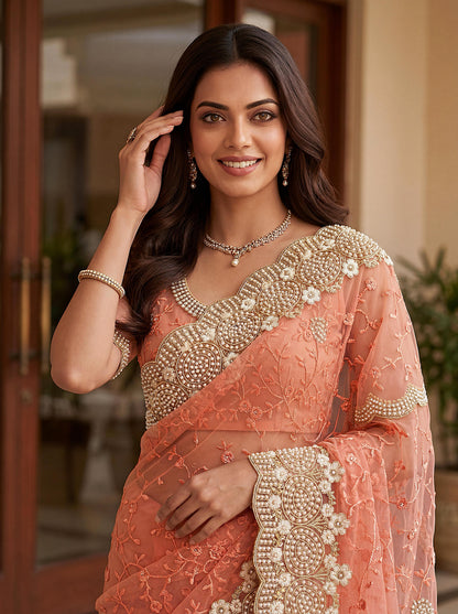 Party Wear Peach Saree with Designer Blouse And Heavy Work