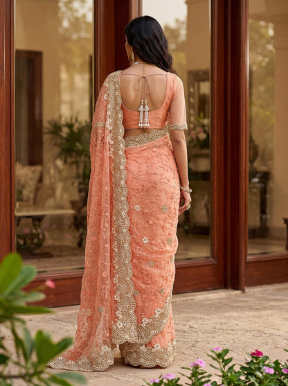 Party Wear Peach Saree with Designer Blouse And Heavy Work