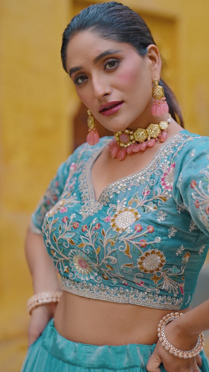 Designer Teal Lehengas with Hand-Embroidered Florals
