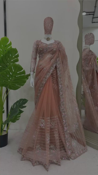 Peach Designer Saree in Soft Net with Heavy Work