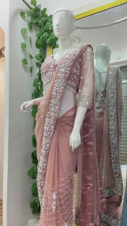 Peach Designer Saree in Soft Net with Heavy Work
